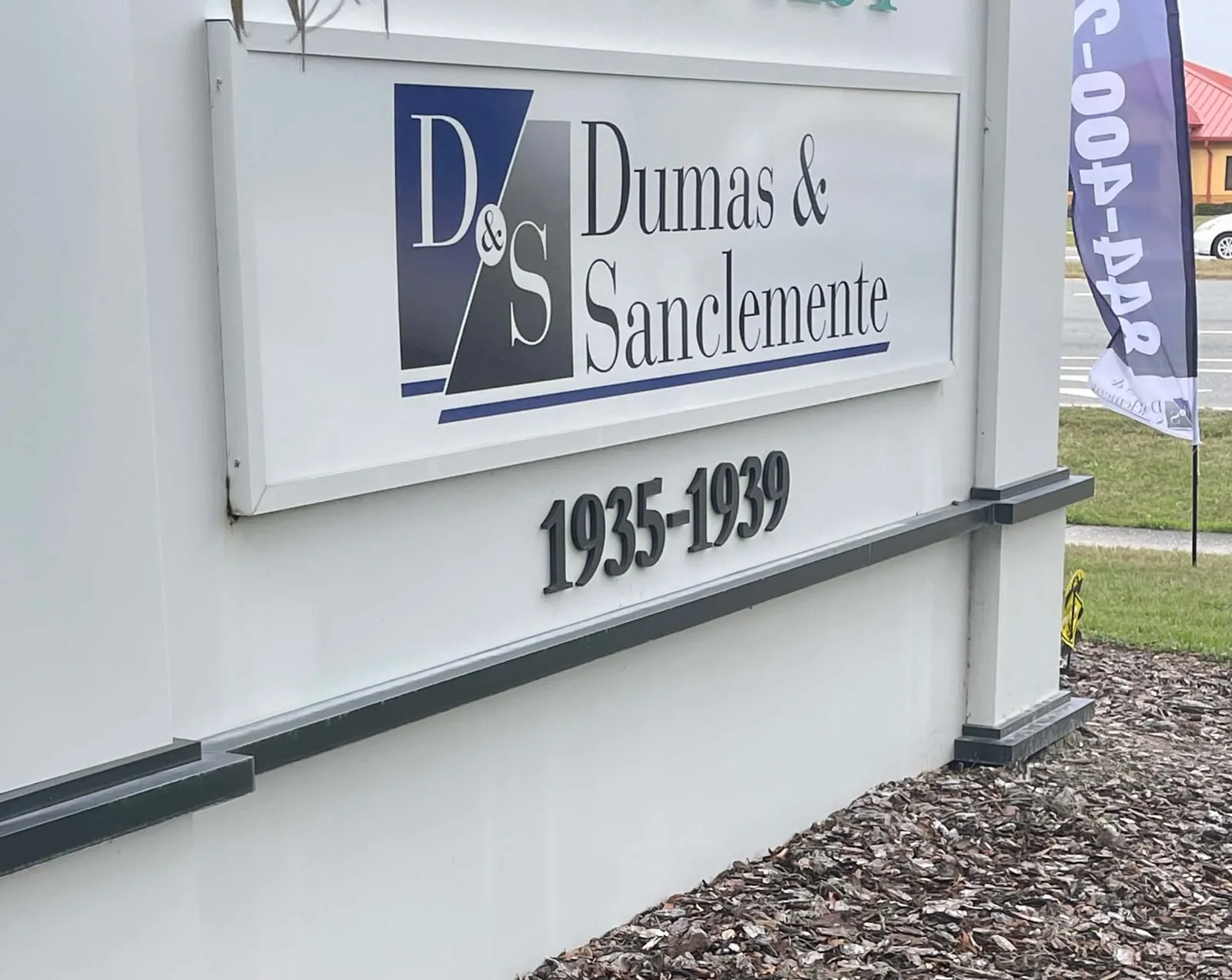 Dumas & Sanclemente office signage at 1935–1939 in Lutz, Florida